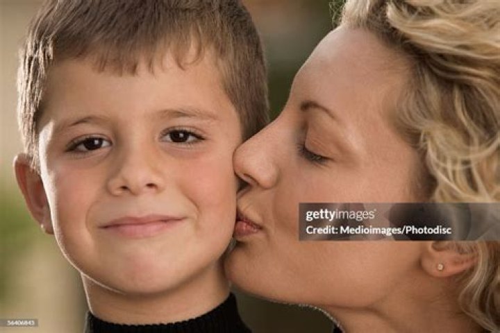 Unbreakable Bonds: The Heartwarming Moment Of A Mom Kissing Her Son